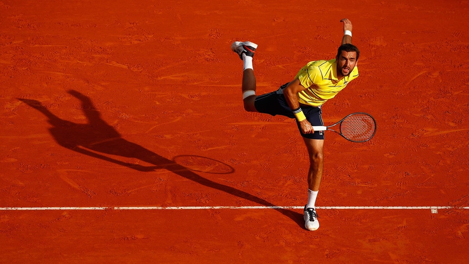 2015 US Open Champion Marin Cilic serves in his secondround match at