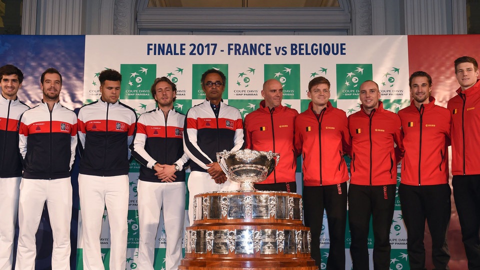 The French (left) and Belgian Davis Cup teams pose for a photo prior to
