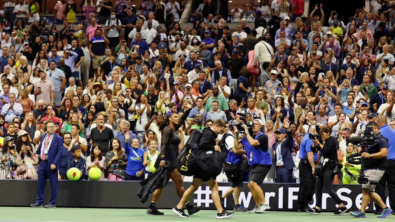 Serena Williams waves to fans as she walks off the court after a women's singles match at the 2022 US Open.
