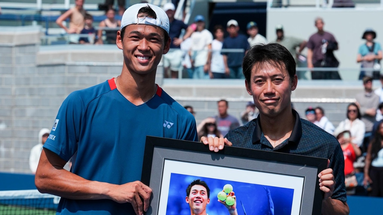 Kei Nishikori poses for a photo with Rei Sakamoto during his retirement ceremony after a Men's Qualifying Singles match during Fan Week as part of the 2026 US Open at USTA Billie Jean King National Tennis Center on Friday, August 28, 2026 in Flushing, NY. (Photo by Garrett Ellwood/USTA)