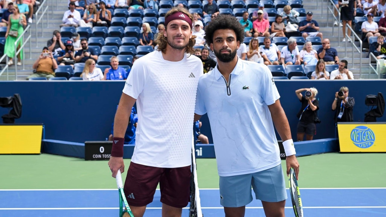 Stefanos Tsitsipas and Arthur Fils pose for a photo at the net before a Men's Singles match on Day Two of the 2026 US Open at USTA Billie Jean King National Tennis Center on Monday, August 31, 2026 in Flushing, NY. (Photo by Pete Staples/USTA)