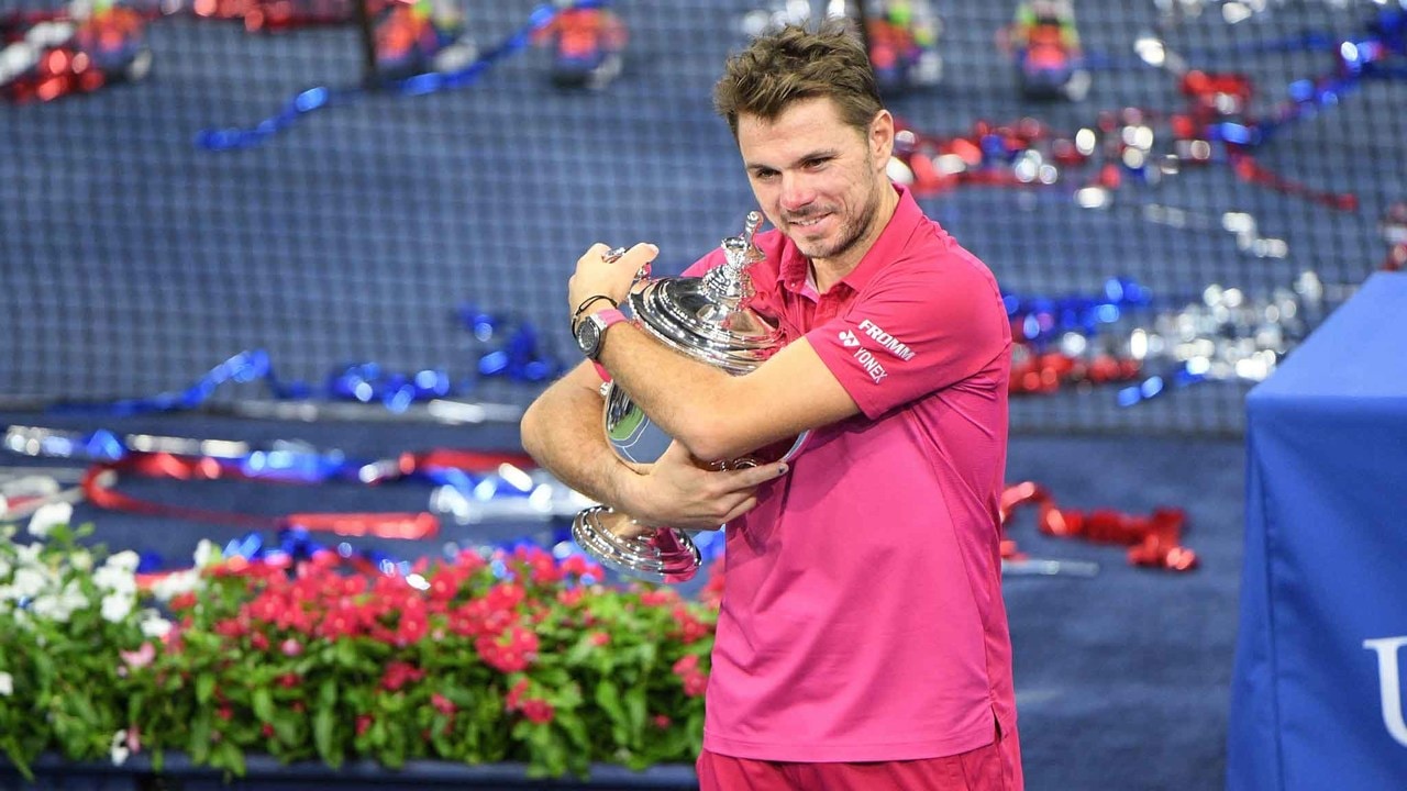 Stan Wawrinka holds his trophy after defeating Novak Djokovic in the 2016 men's singles final.